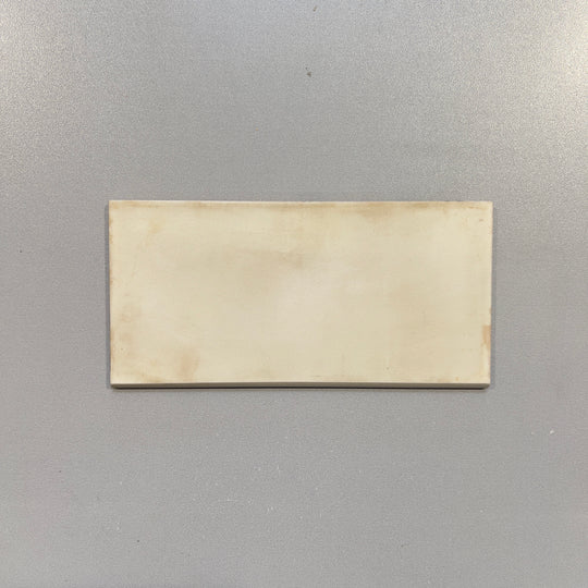 Cream (4x8) concrete look porcelain subway tile - bdolchacre